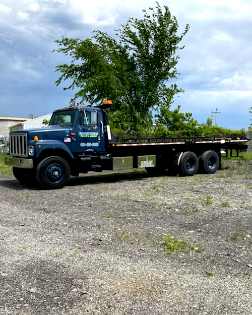 Countywide Towing & Hauling Flat Bed Tow Truck